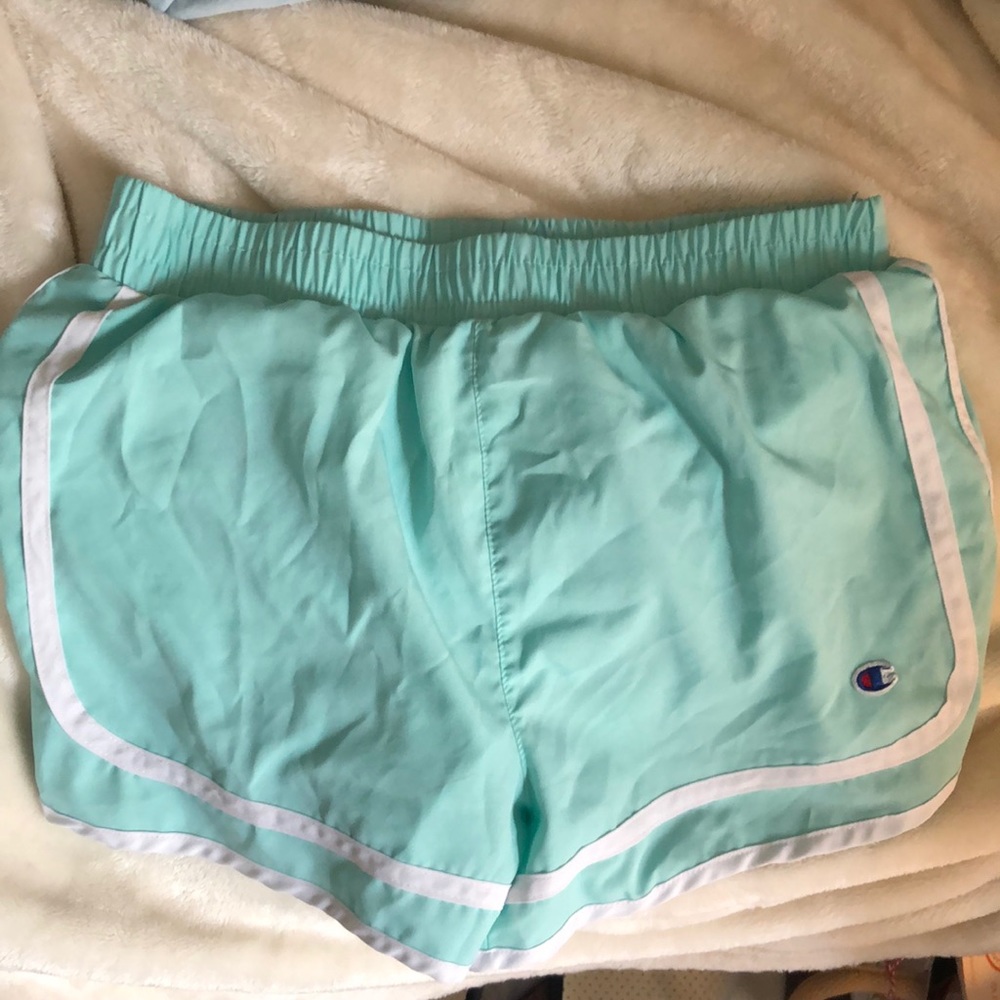 light blue champion shorts with white line around them. Great condition